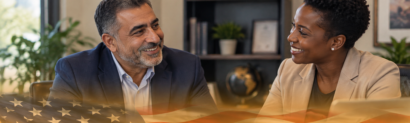 Dallas immigration attorney consulting with a client about an E-1 treaty trader visa