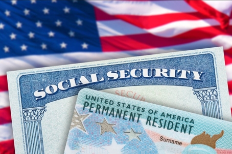 American flag, social security card and Green card