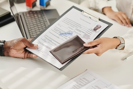 person getting approved at immigration interview